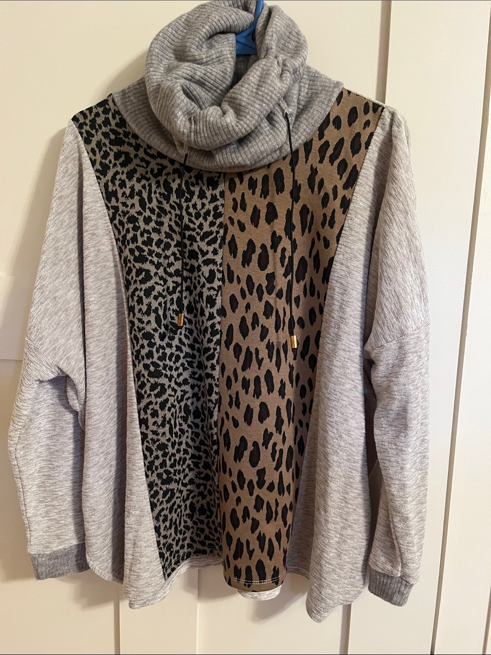 THML multi animal print tunic. Cowel neck. Size XS